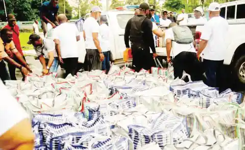 Hundreds of vulnerable Rivers residents brave the rain for free food